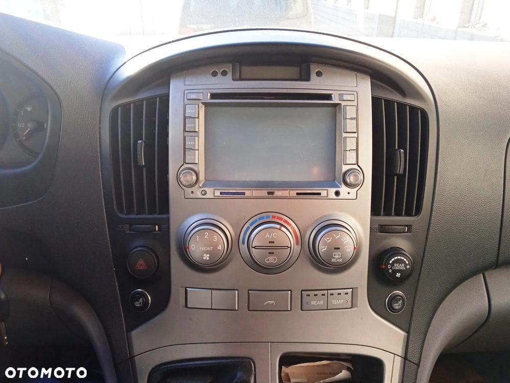 Na części Hyundai H1 II Wagon 2.5 CRDI 2010 lakier NBA silnik D4CBA skrzynia biegów GZ04 maska klapa drzwi przesuwne zderzak lampa błotnik fotel kanapa 7 miejsc szyba - 12