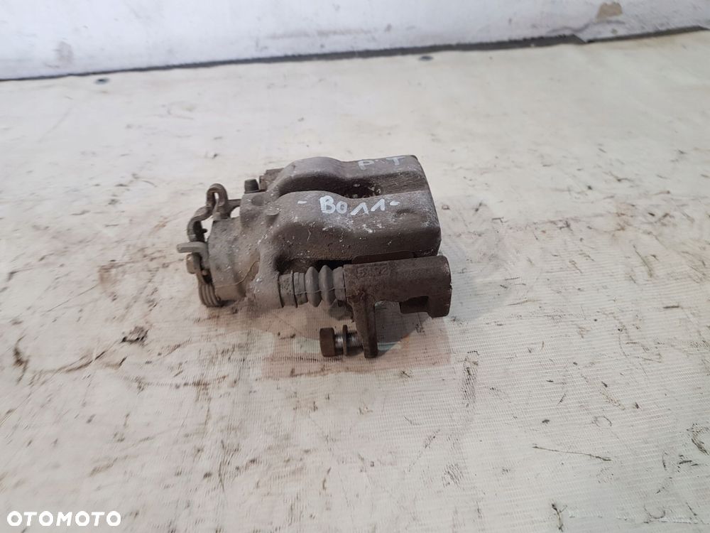 zacisk hamulcowy prawy tył fiat 500l 1.3d 12r- - 2