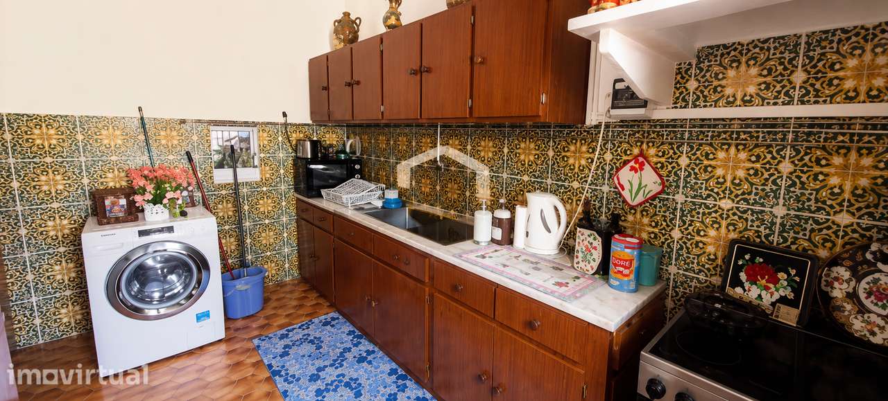 Moradia  T2 constituída por 2 pisos com quintal e terraços - Grande imagem: 4/34
