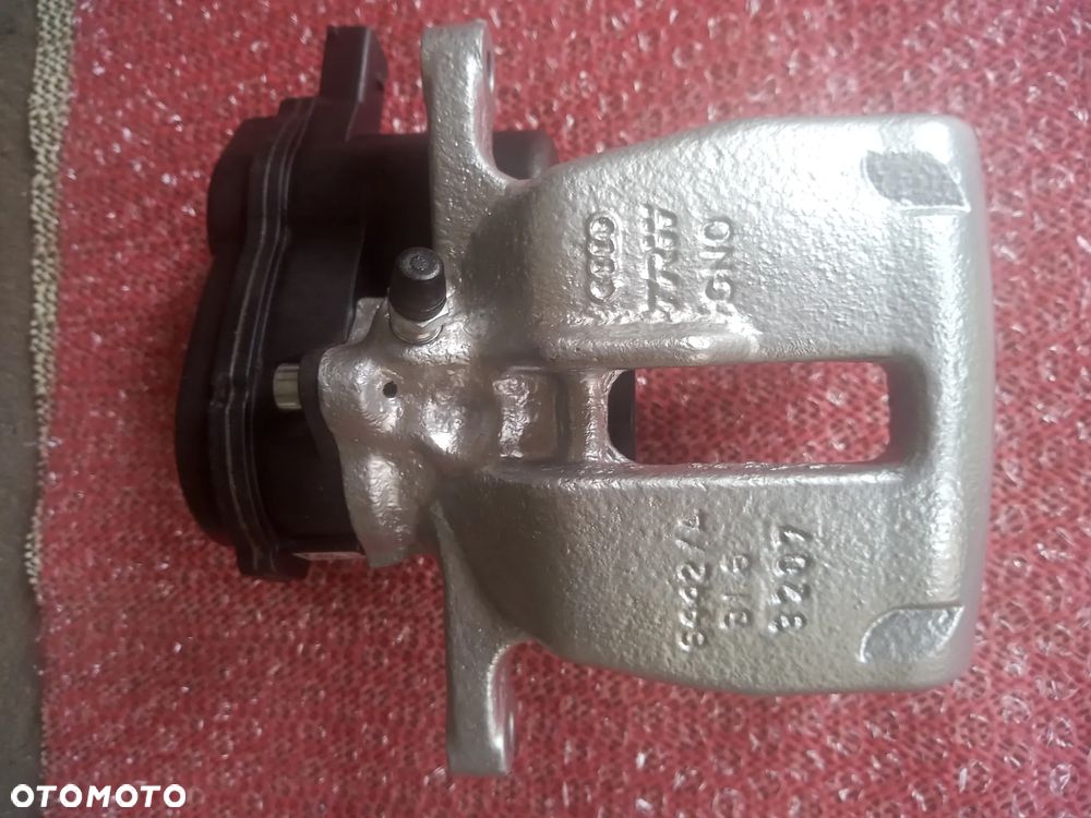 ZACISK HAMULCOWY VW PASSAT B5 B6 B7 B8 CC TIGUAN SHARAN ARTEON SEAT ALHAMBRA GOLF VII AUDI A6C6 C5 C7 A4 B8 A8 D3 D4,TT,Q3,Q5,A5,MAZDA CX5 CX7 CX9 MAZDA 3 ,6, VOLVO S60 V60 XC60 XC70 V70 S80 HYUNDAI i40,i30,KONA TUCSON KIA SPORTAGE CEED, PROCEED OPTIMA LANCIA THESIS FORD MONDEO MK4,MK5,V, GALAXY S-MAX KUGA 2 ,3 ESPACE ,EDGE, RENAULT SCENIC III MEGANE III TALISMAN SKODA Octavia III Superb III QUAD CF MOTO LIGIER X Too NOVA MICROCAR MC1 MC2 Cargo,IVECO Daily Seat Leon III BMW 5 - 11