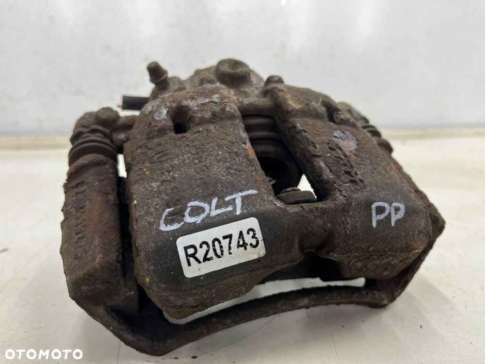 Zacisk hamulcowy Mitsubishi Colt VI 6 Z30 Smart Forfour I w454 04-12r. prawe przednie mocowanie - 7