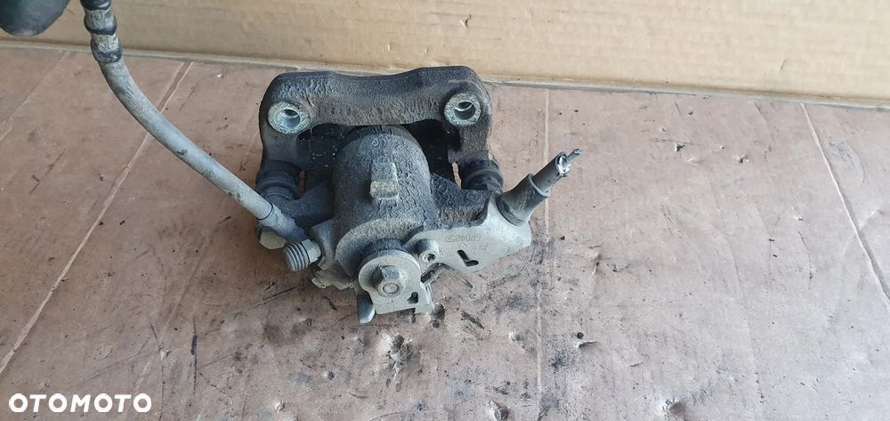 Zacisk hamulcowy lewy tył tylny lewy VW Polo V 6R - 6