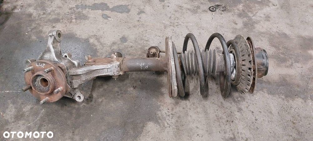 AMORTYZATOR ZWROTNICA PRAWY PRZÓD CARAVAN IV 2.4 - 1