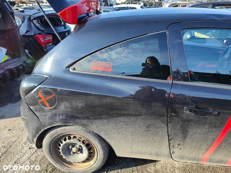 OPEL CORSA D 11r BŁOTNIK PRAWY TYŁ Z20R