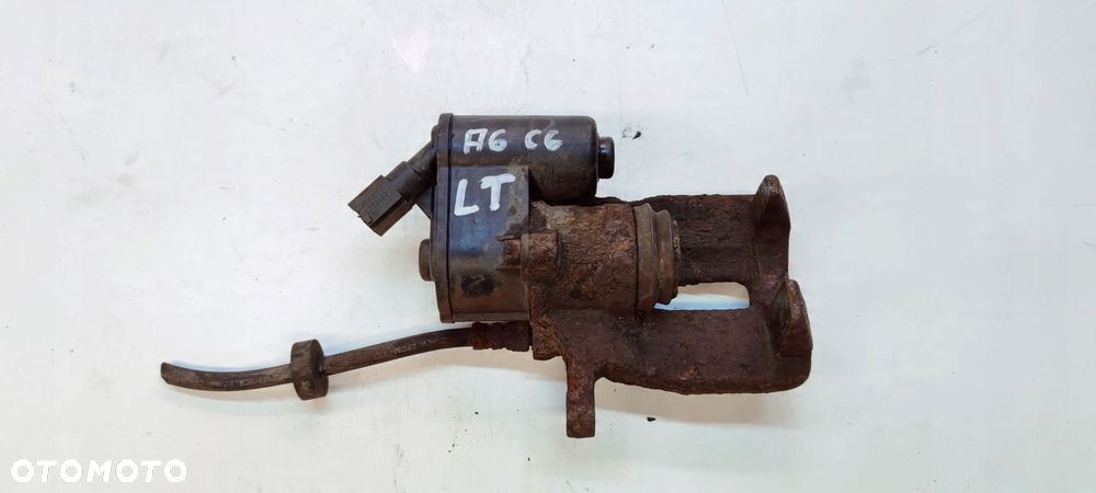 ZACISK HAMULCOWY LEWY TYŁ AUDI A6 C6 330MM ZĄBEK - 1