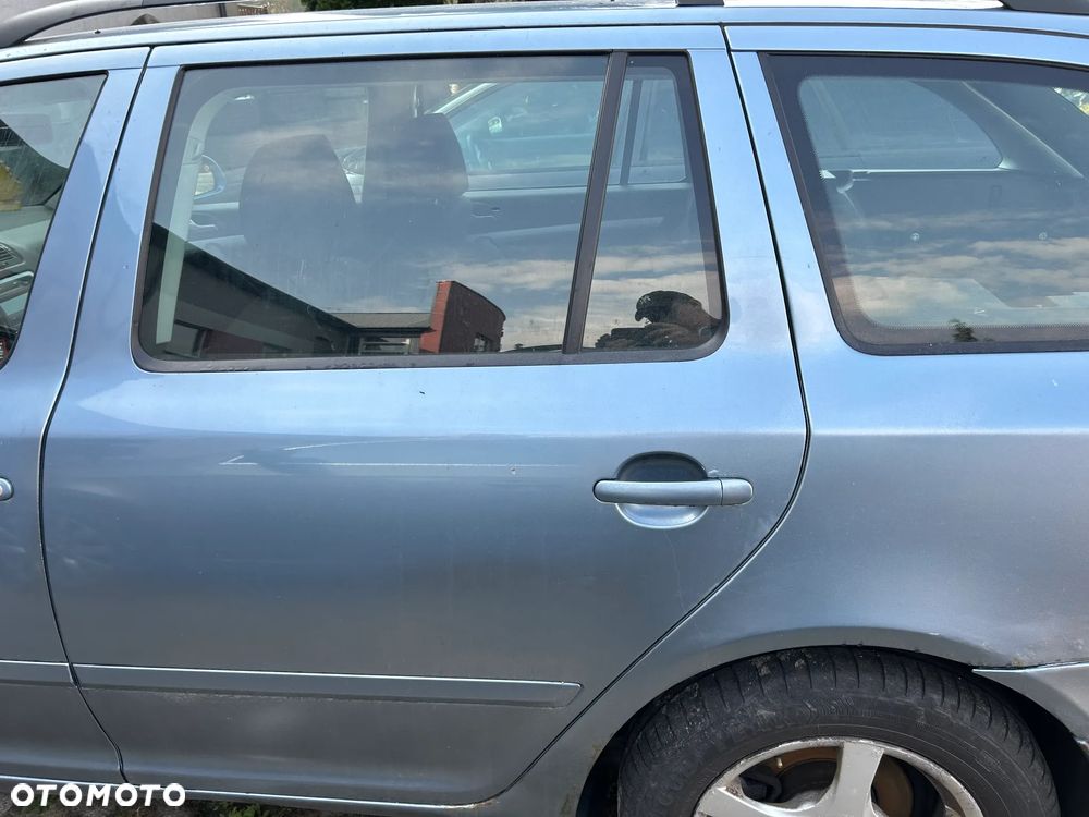 SKODA OCTAVIA II LIFT KOMBI DRZWI LEWE PRAWE TYŁ - 1