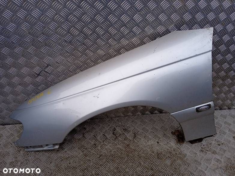 BŁOTNIK LEWY OPEL OMEGA B - 1