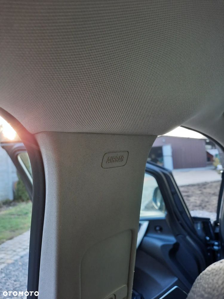 Opel Astra IV 2.0 CDTI Sport - 31