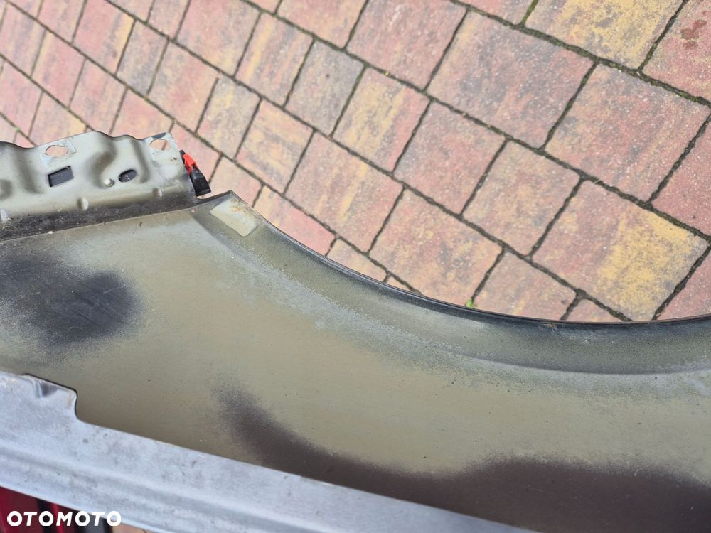 blotnik lewy przod saab 95 ng 10-12 - 3