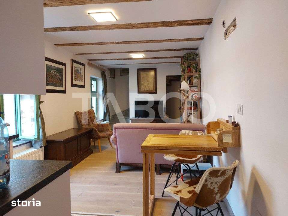 Apartament de vanzare 105 mp 3 camere curte 340 mp in acte Cisnadie — fotografia 1