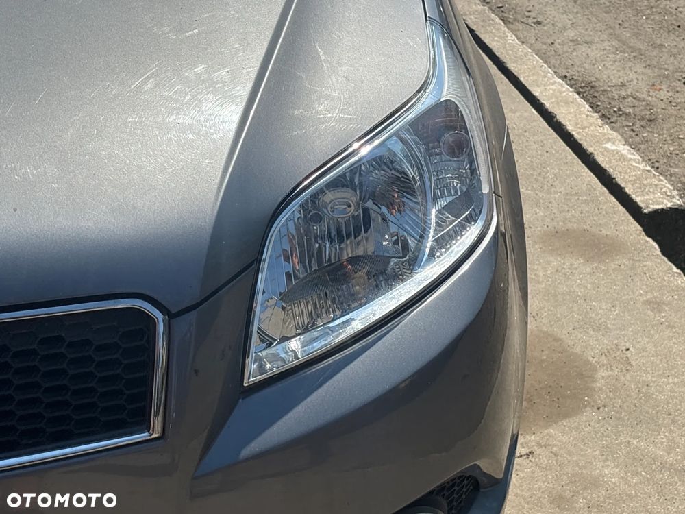 LAMPA PRZEDNIA PRAWA LEWA CHEVROLET AVEO 2 2008R - 1