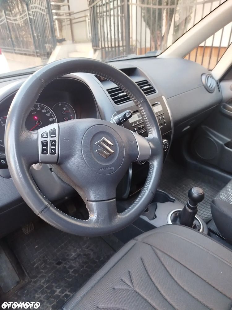 Suzuki SX4 1.6 GLX / Comfort - 14