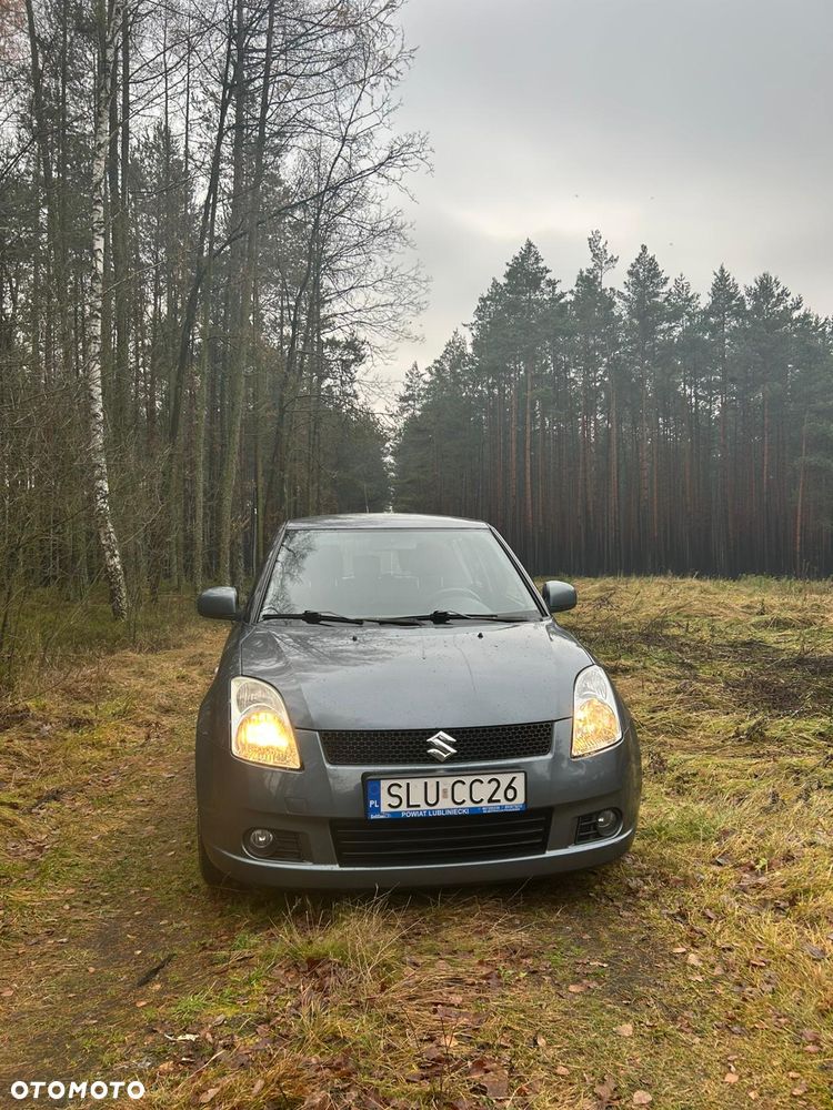 Suzuki Swift 1.3 Club - 4