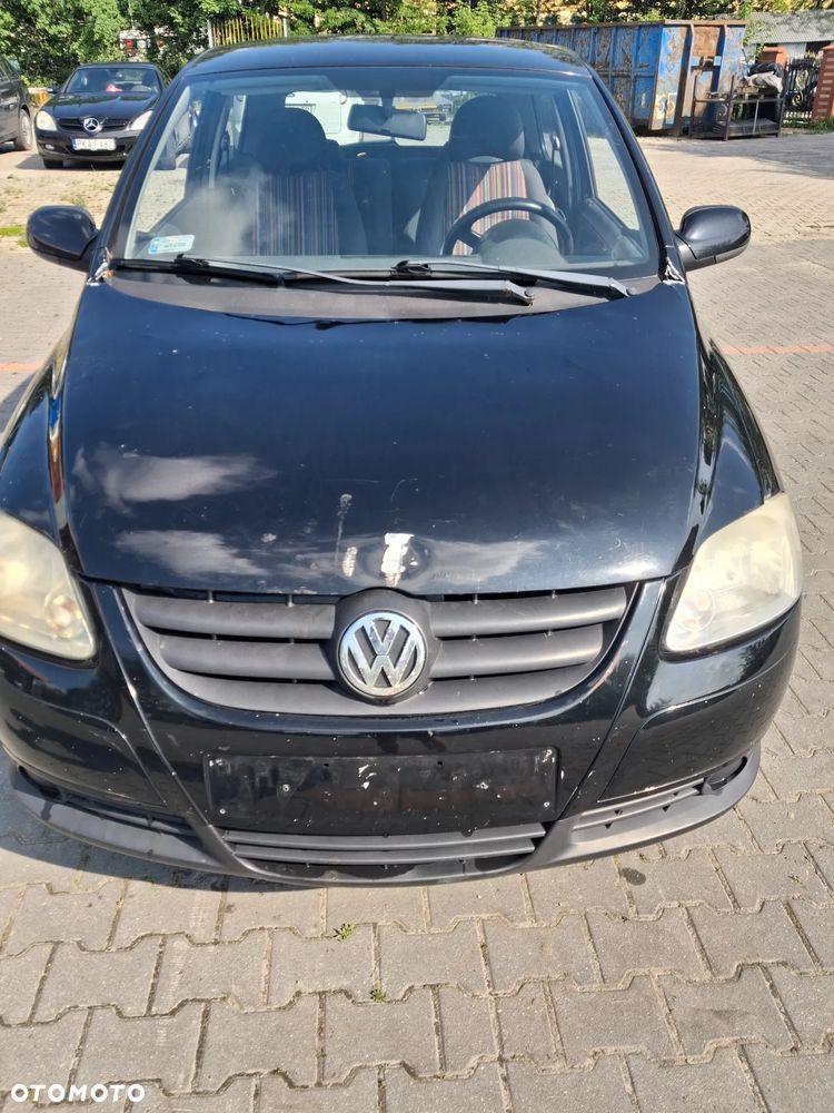 Volkswagen Fox silnik kompletny 1.4 TDI BNM 70KM skrzynia biegów HCS drzwi klapa zderzak błotnik lusterko kolor czarny N2C/BC pompowtrysk turbina dwumasa sprzęgło sterownik moduł przewód rura wiązka maglownica czujnik mcperson zwrotnica piasta zacisk pompa pompka alternator sprężarka klimatyzacji panel szyba boczek fotel kierownica lewarek przepustnica pokrywa osłona nadkole zbiorniczek klema wiązka mechanizm lampa belka sanki zamek schowek zegary manetki NA CZĘŚCI - 9