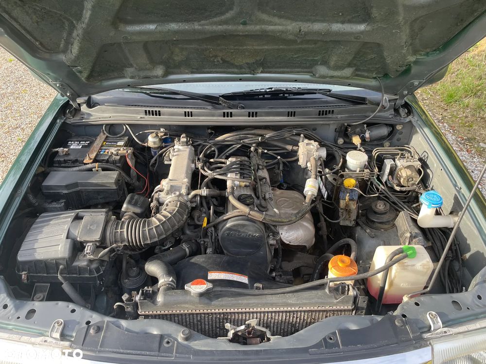 Suzuki Grand Vitara 1.6 - 15