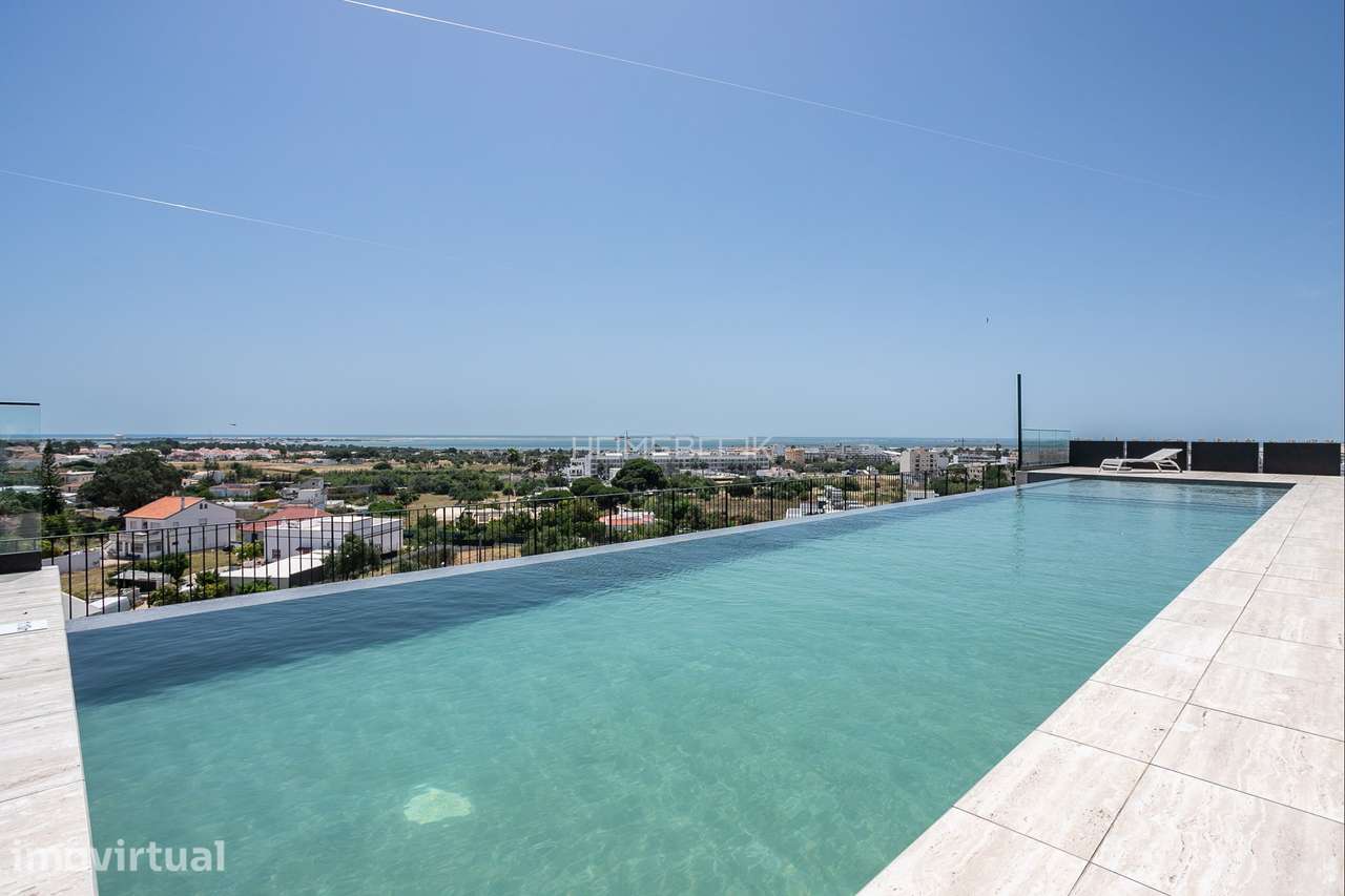 Apartamento Novo T2 - Último andar - Piscina Rooftop e Garagem - Grande imagem: 3/38