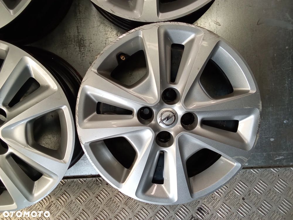 Felgi strukturalne Opel Adam Corsa D E Karl 6Jx15 et39 4x100 - 4