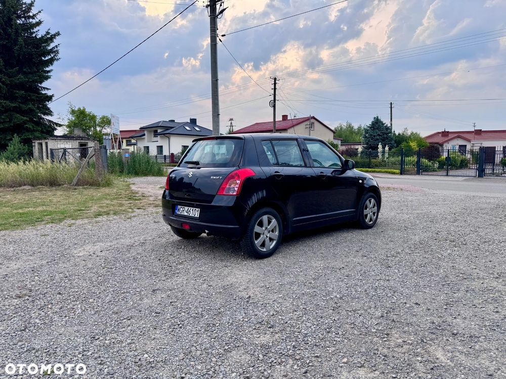 Suzuki Swift 1.3 Club - 7