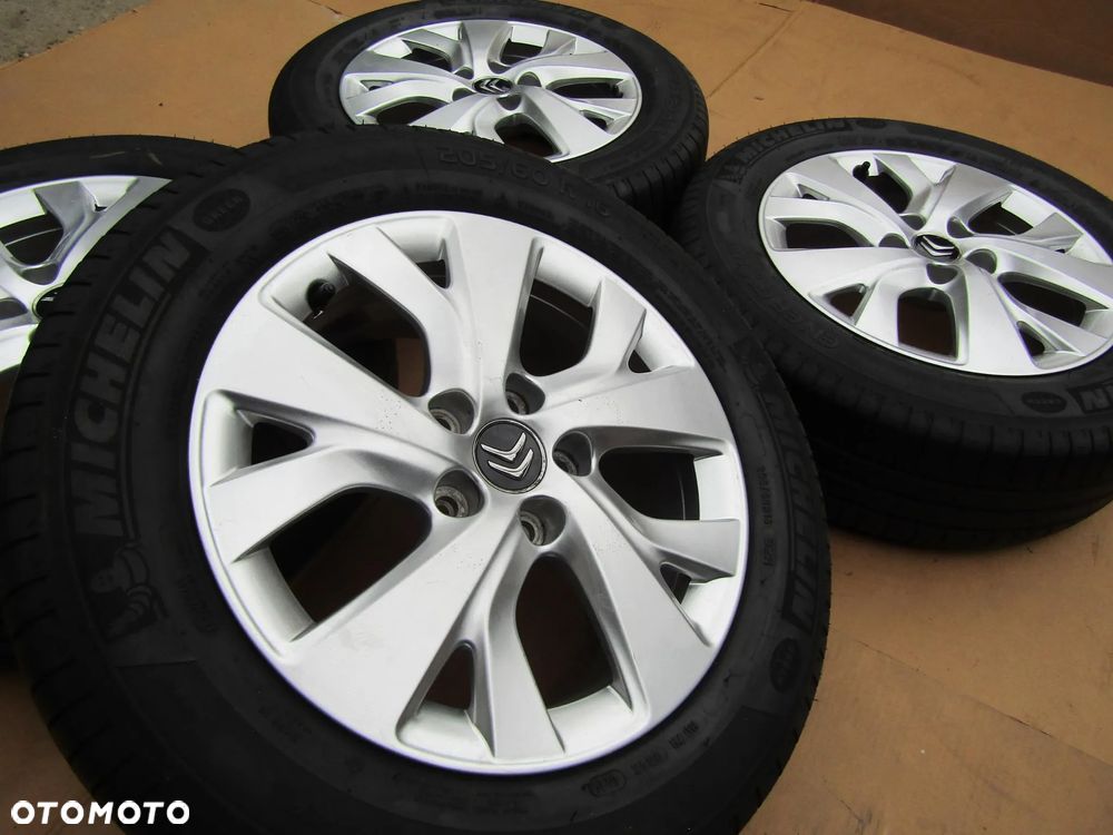 4x Felgi Aluminiowe Koła 16 Citroen C4 II Picasso Grand Berlingo III Peugeot Partner III 3 Opel Combo E 6,5 j 5x108 ET47 piasta 65,1 mm + Opony 205/60 16 Michelin Letnie - 12