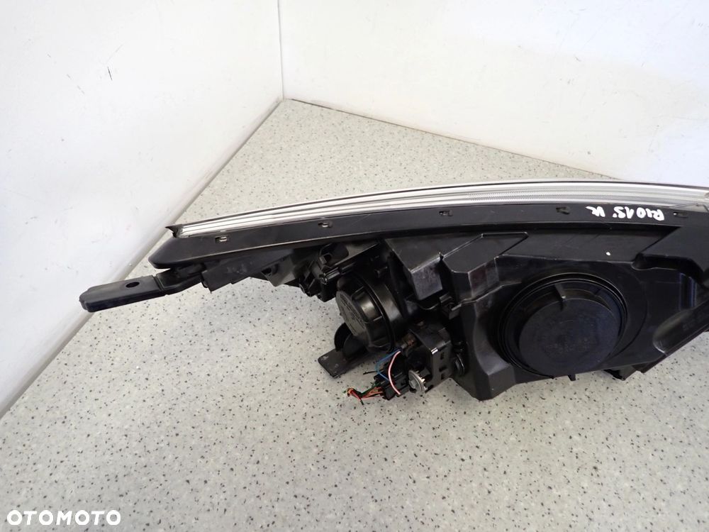 KIA RIO III 11-14 REFLEKTOR LAMPA PRZEDNIA LEWA - 11
