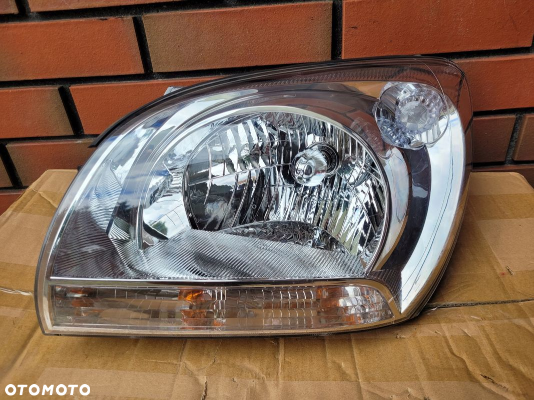 DEPO Reflektor lewy KIA SPORTAGE II 04- - 4