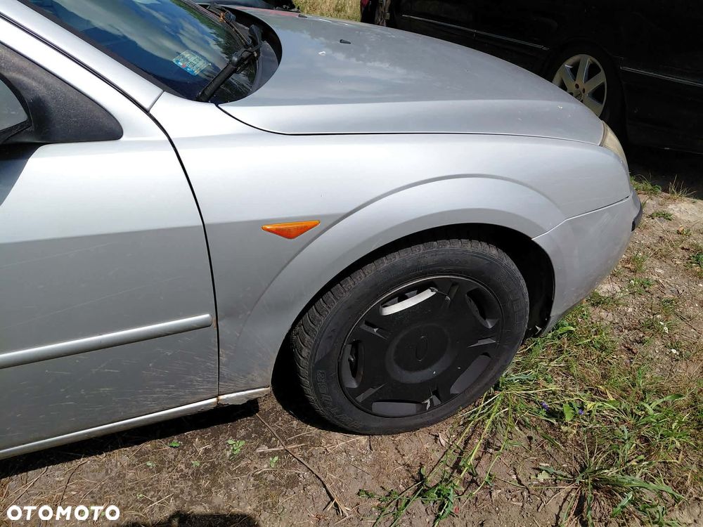 części Ford Mondeo mk3 przed lift 1.8 benzyna sedan 2002r BŁOTNIK przód prawy lewy 60 - 1