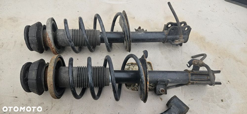Zwrotnica piasta lewa prawa amortyzator sprężyna ABS zacisk wahacz Opel Agila B 1,0 2009r - 2