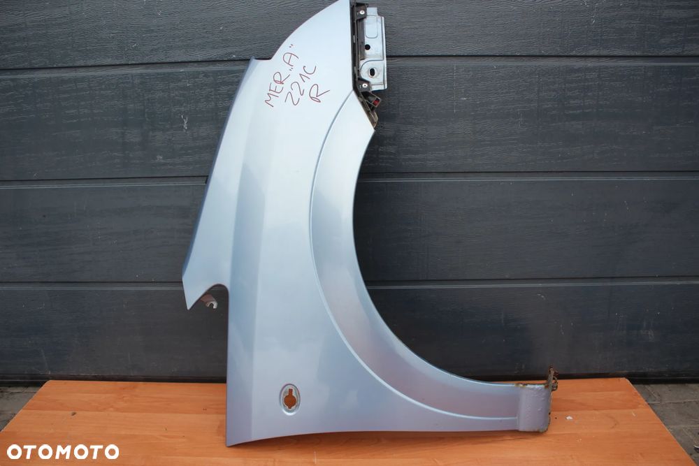 BŁOTNIK PRAWY PRZÓD PRAWY PRZEDNI OPEL MERIVA A Z21C