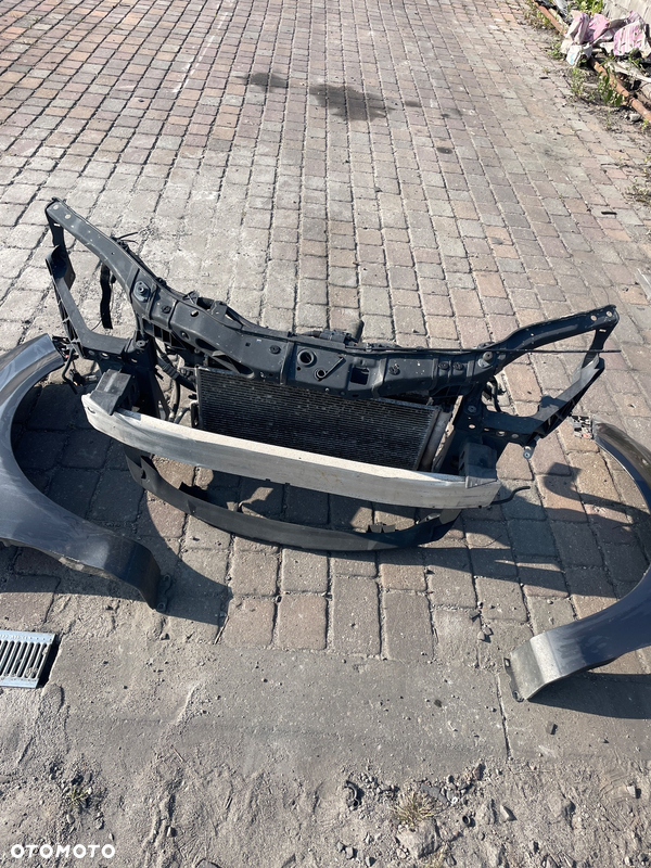 Pas przedni kompletny Opel Corsa D