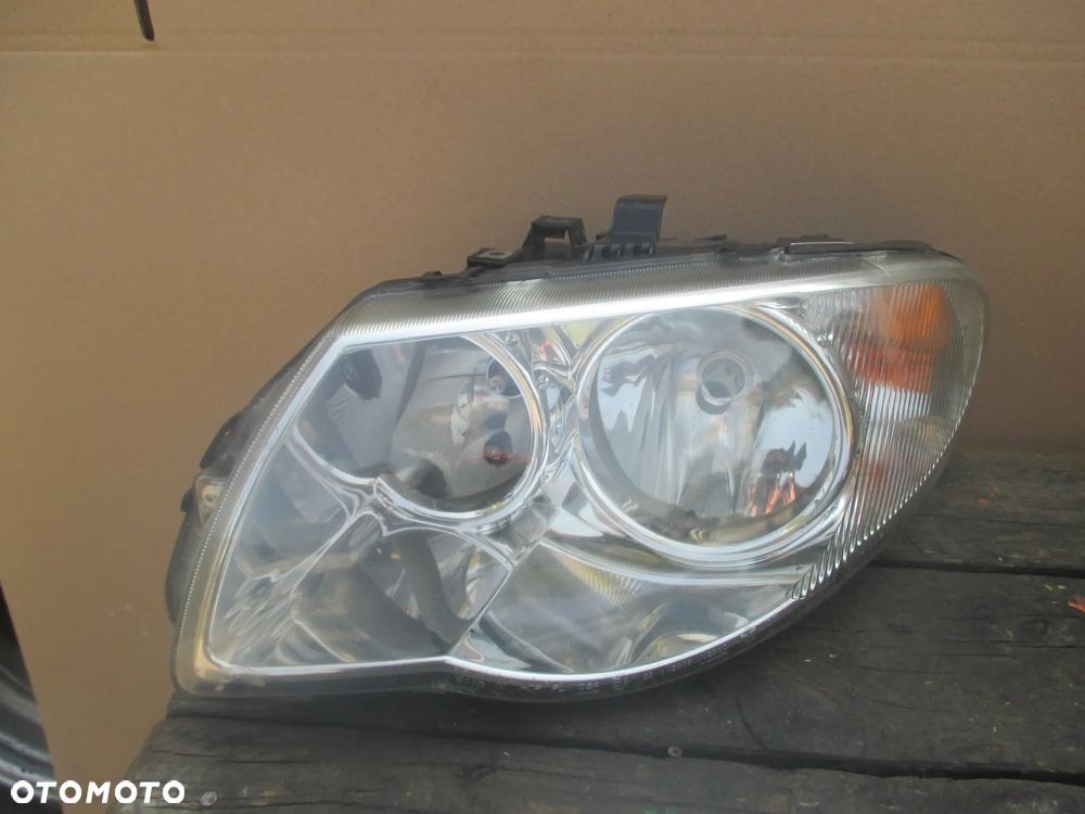 lampa lewa Chrysler Voyager lift ZKW Europa - 1