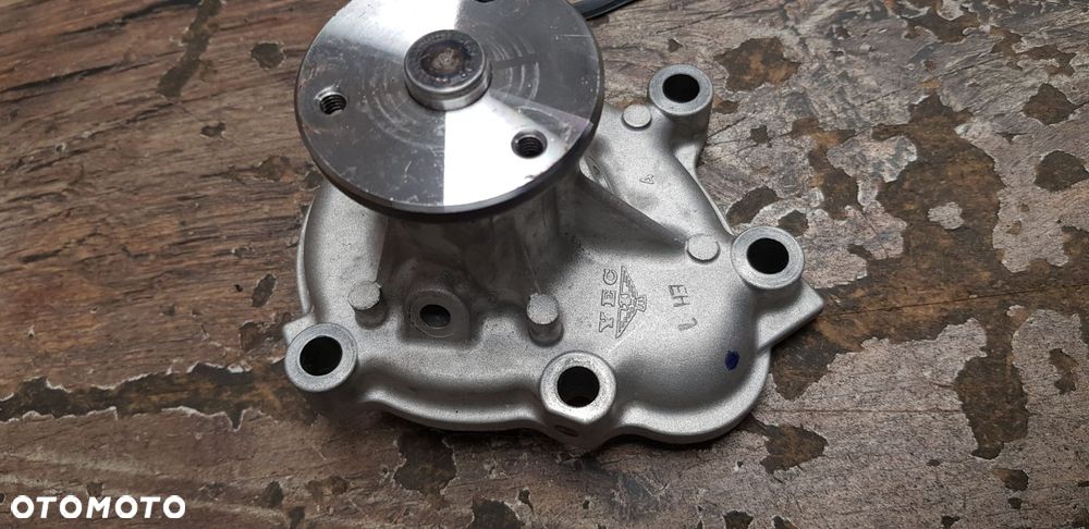 Oryginalna pompa wody Opel Astra Corsa Zafira Meriva 98003100 - 4