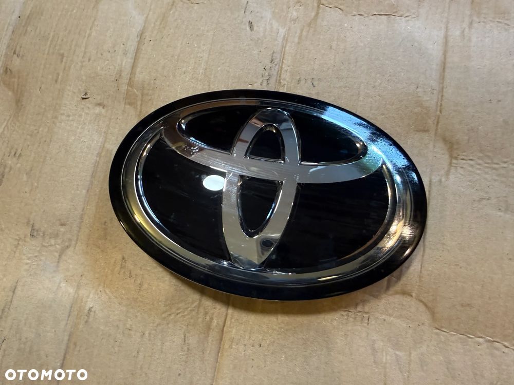 Emblemat znaczek Toyota Corolla Cross 2025 90975-A2009 OE - 1