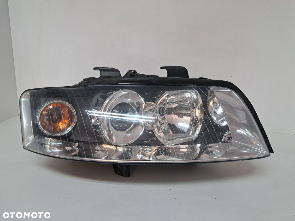 AUDI A4 B6 LAMPA PRAWA PRZÓD PRZEDNIA EU SOCZEWKA 8E0941004 00-04 - 1