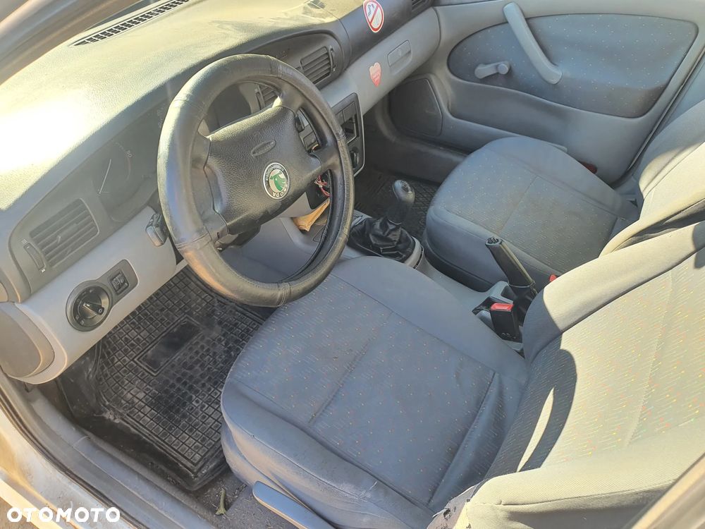 skoda octavia I lift fotel kanapa deska kokpit podsufitka boczek podłokietnik licznik panel szyb - 2