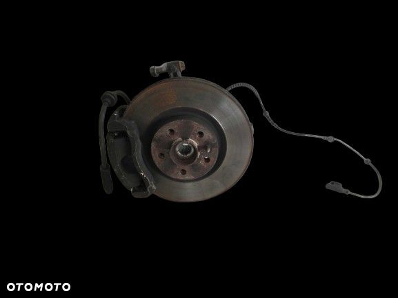 FIAT 500L 1.3 MTJ ZACISK TARCZA ZWROTNICA LEWA