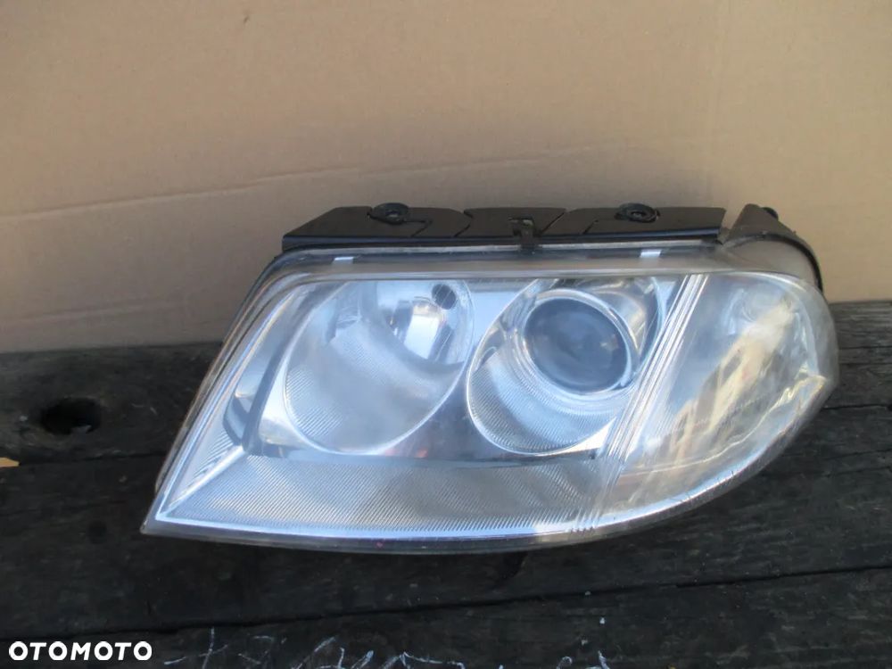 Lampa lewa PASSAT B5 LIFT HELLA EUROPA - 1