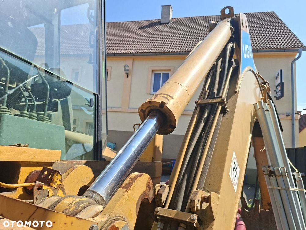 Caterpillar 428 C 4X4 - 34