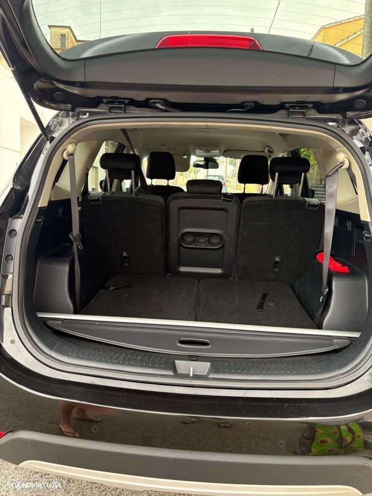 Kia Carens - 11