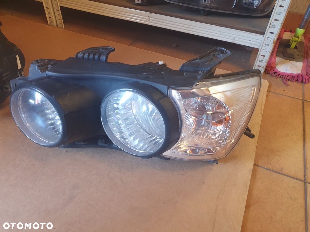 REFLEKTOR LEWY CHEVROLET AVEO III T300 EUROPA - 6
