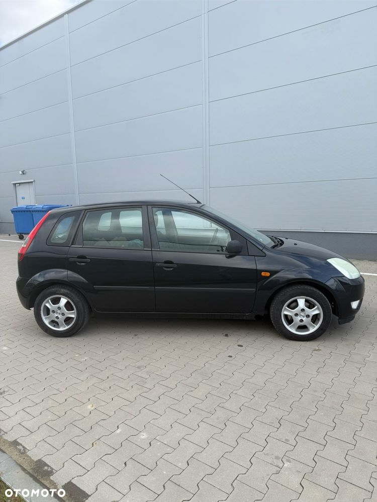 Ford Fiesta 1.4 Ghia - 4