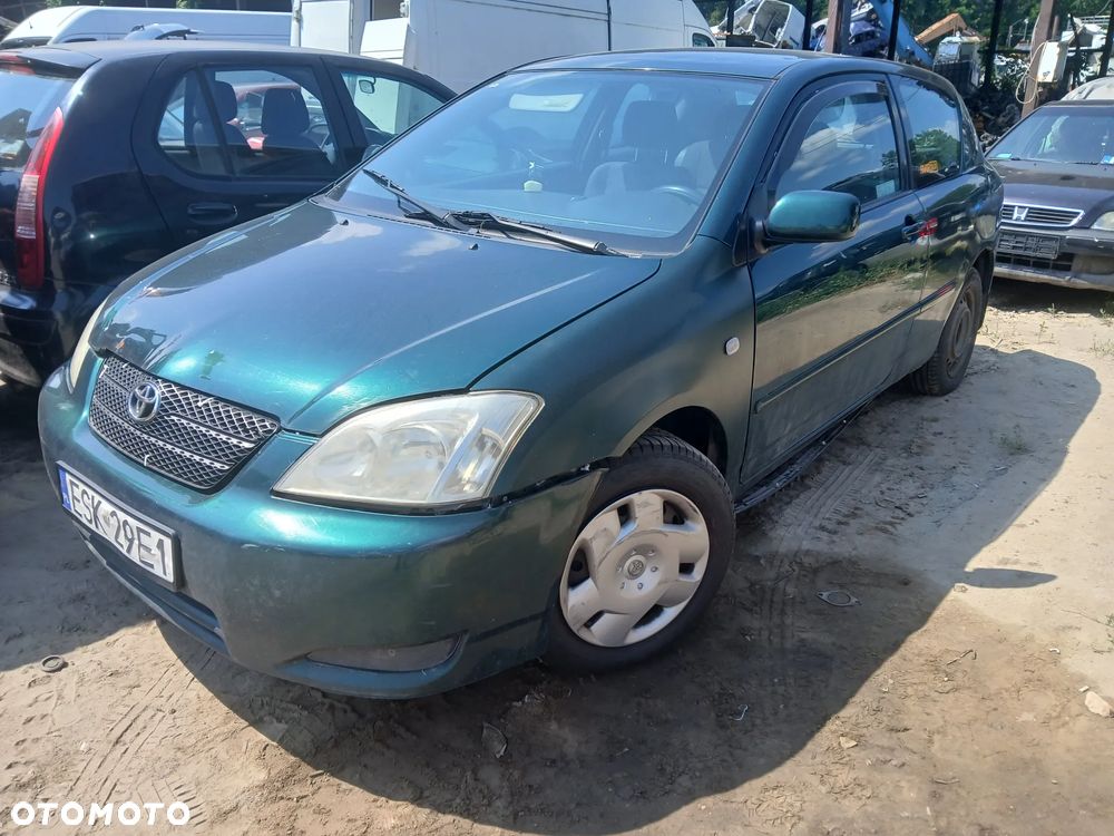 TOYOTA COROLLA HB e12 1.4 4ZZFE MTM  6R4 maska pokrywa silnika klapa bagażnika zderzak lampa reflektor pas przedni stop lampy halogeny przeciwmgłowe odblaski grill atrapa znaczek błotnik błotniki - 1