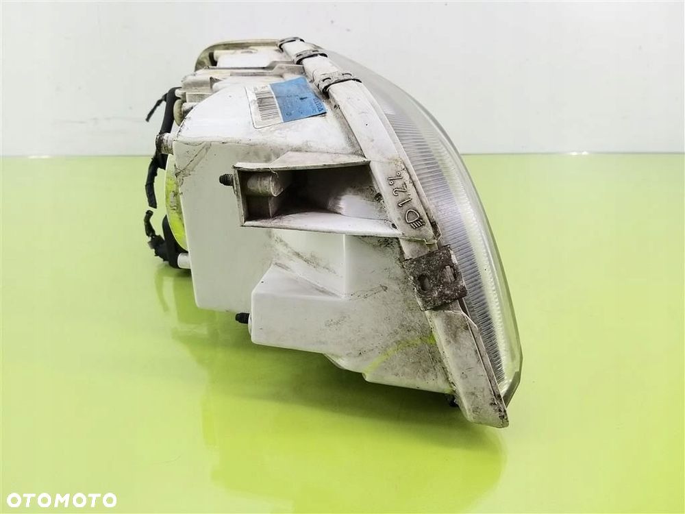 Reflektor lampa przód lewa Volvo V40 1999-2004 R AG00786133 30899682 - 4