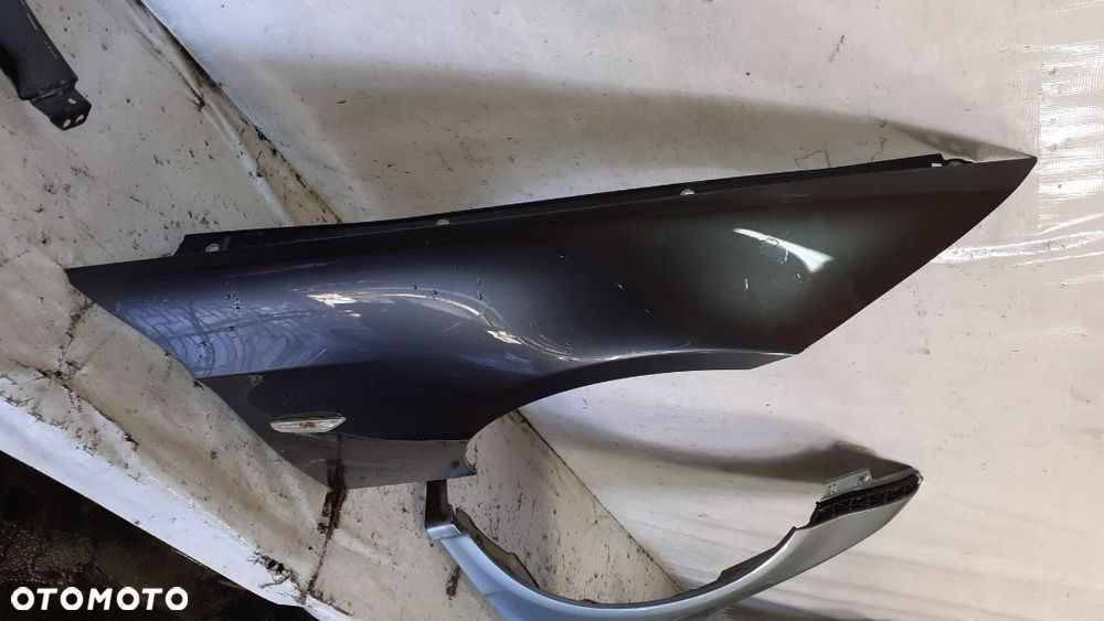 * BŁOTNIK PRAWY PRZÓD BMW E90 E91 - 2