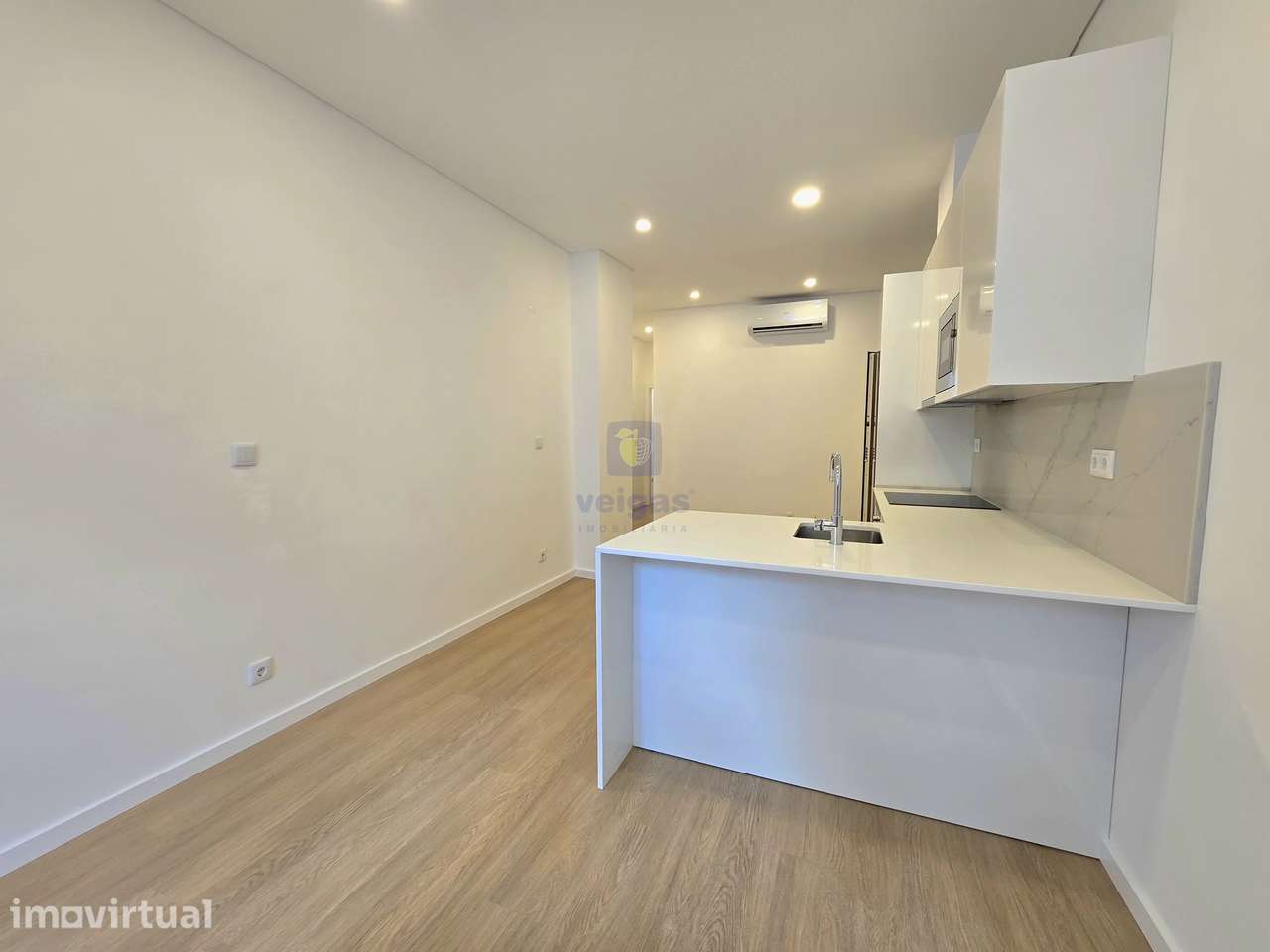Apartamento T2 com terraço com duas frentes ao nível do RC no empreend - Grande imagem: 4/20