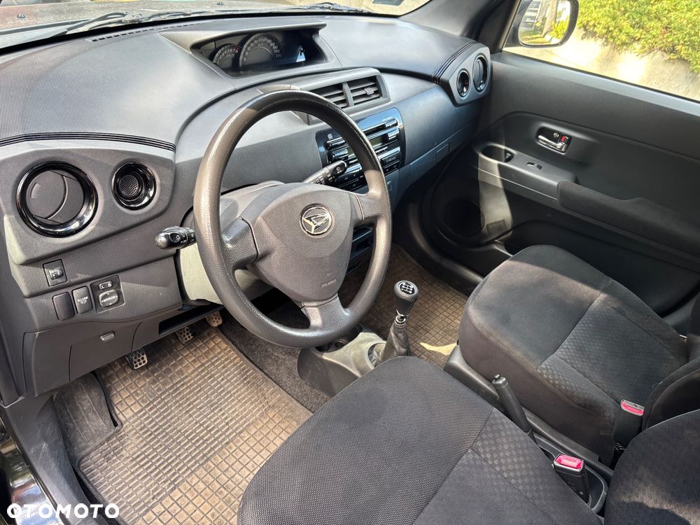 Daihatsu Materia 1.5 - 7