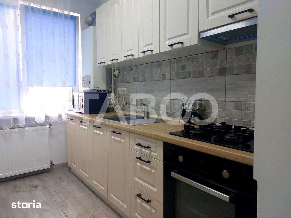 Apartament renovat recent 2 camere parter balcon zona Dioda Sibiu — fotografia 1
