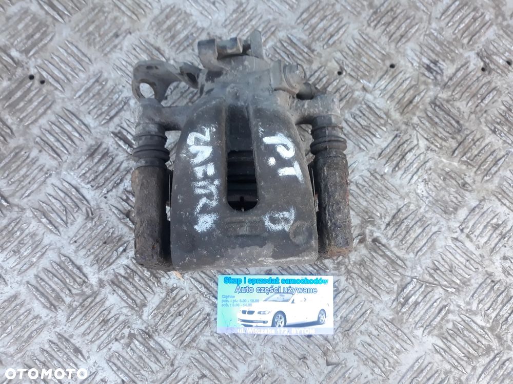 ZACISK PRAWY TYŁ OPEL ZAFIRA B  1,9 CDTI - 1