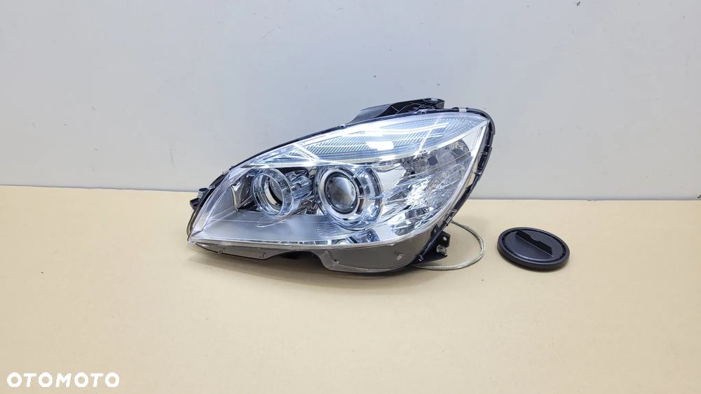 MERCEDES W204 CLC CL203 LAMPA REFLEKTOR BI-XENON PRZÓD PRZEDNI LEWY NOWA TYC - 1