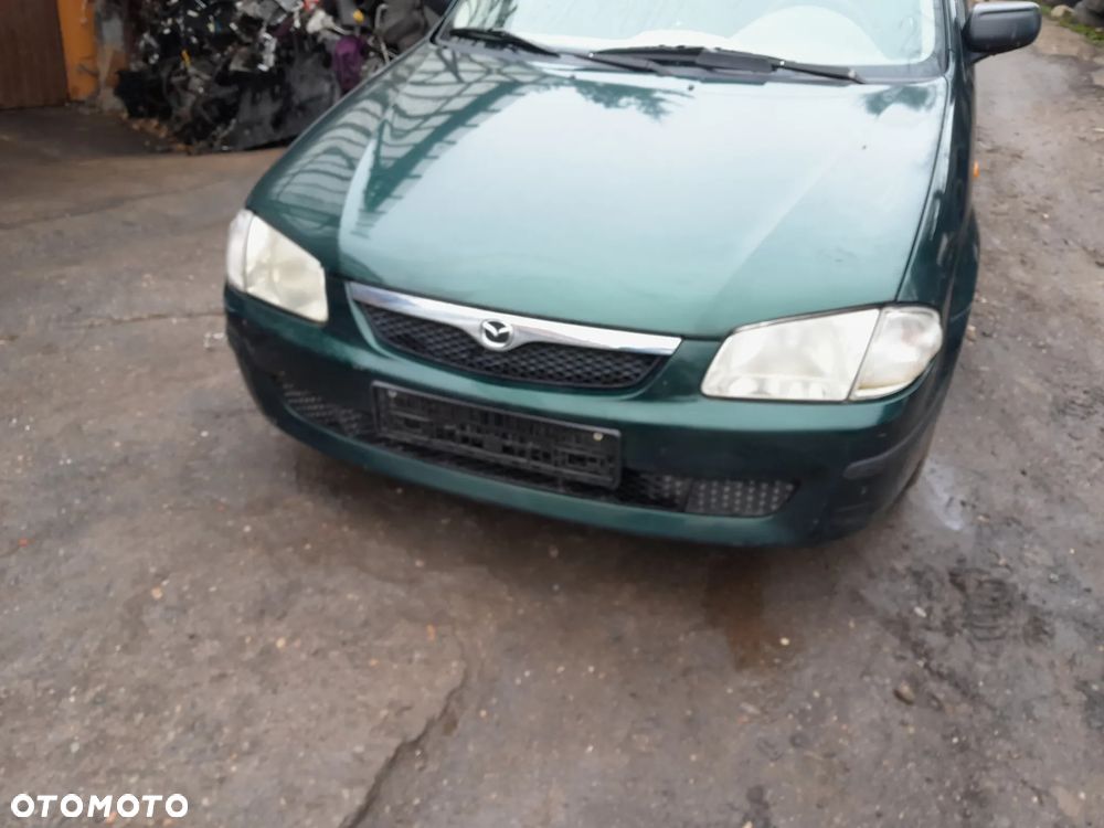 Mazda 323 323f 323  BJ 98-03  Maska lampa zderzak atrapa w kolor 18J - 2