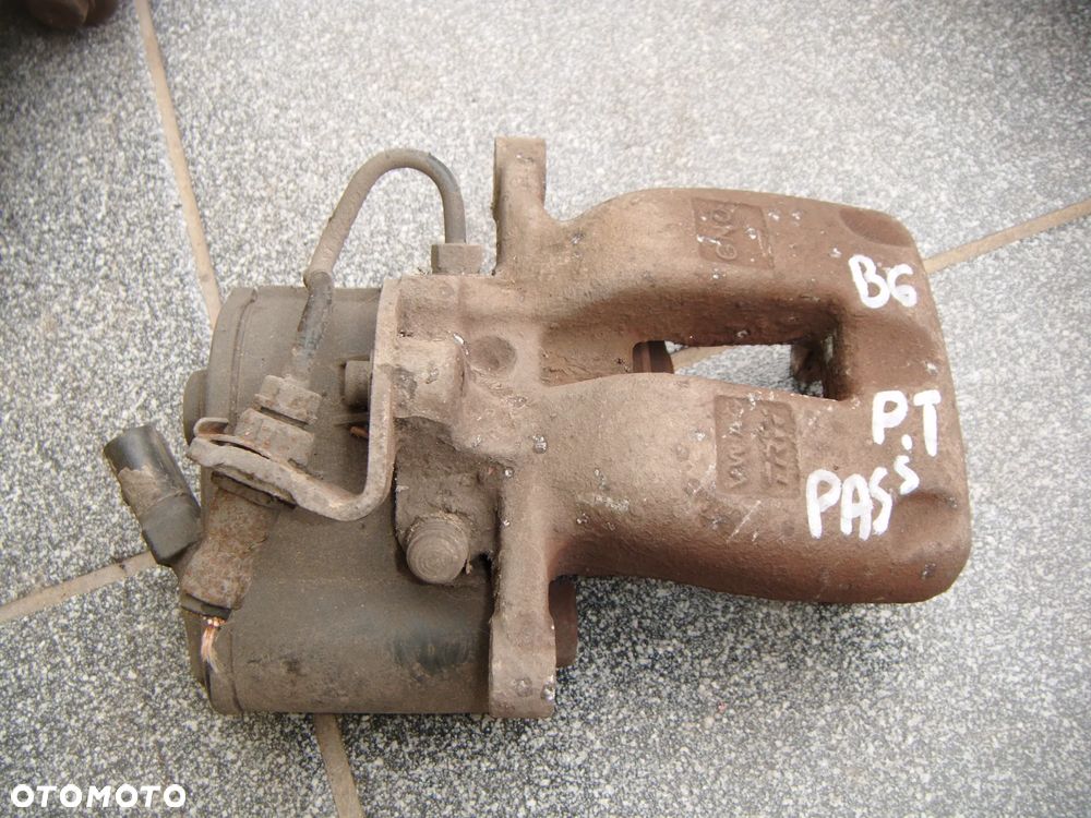 vw passat b6 zacisk prawy tył - 1